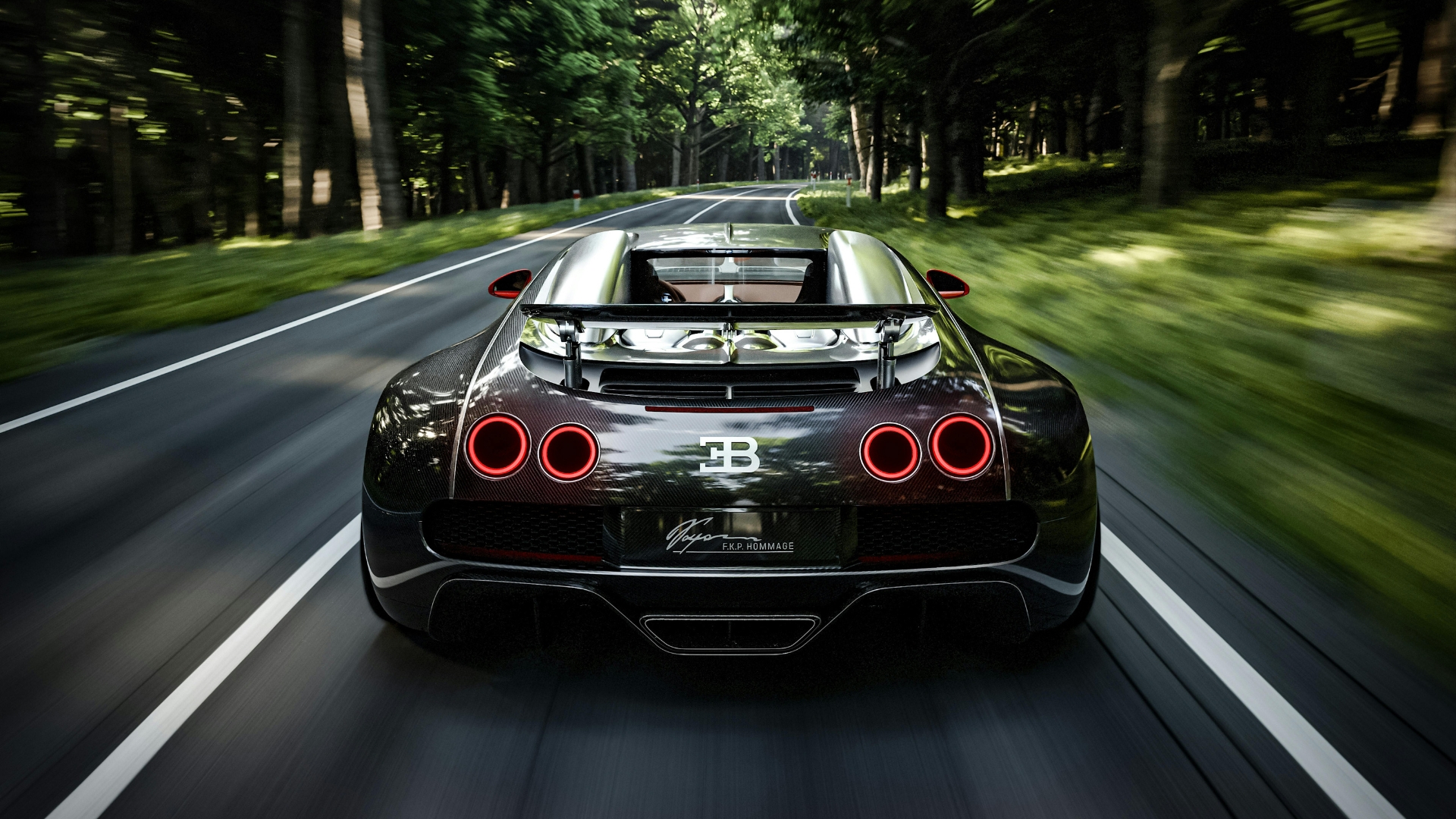 Bugatti Veyron driving on a quiet country road lined with tall trees, pictured from behind