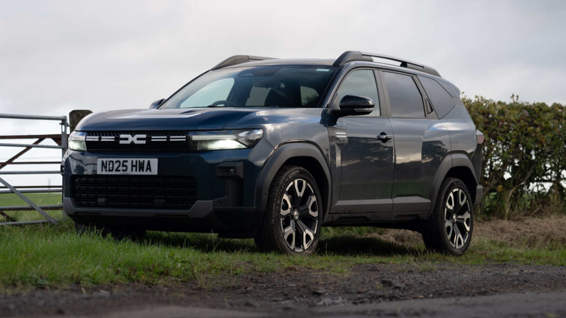 Dacia Bigster parked outside on the grass