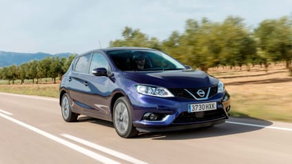 Nissan Pulsar driving along a road